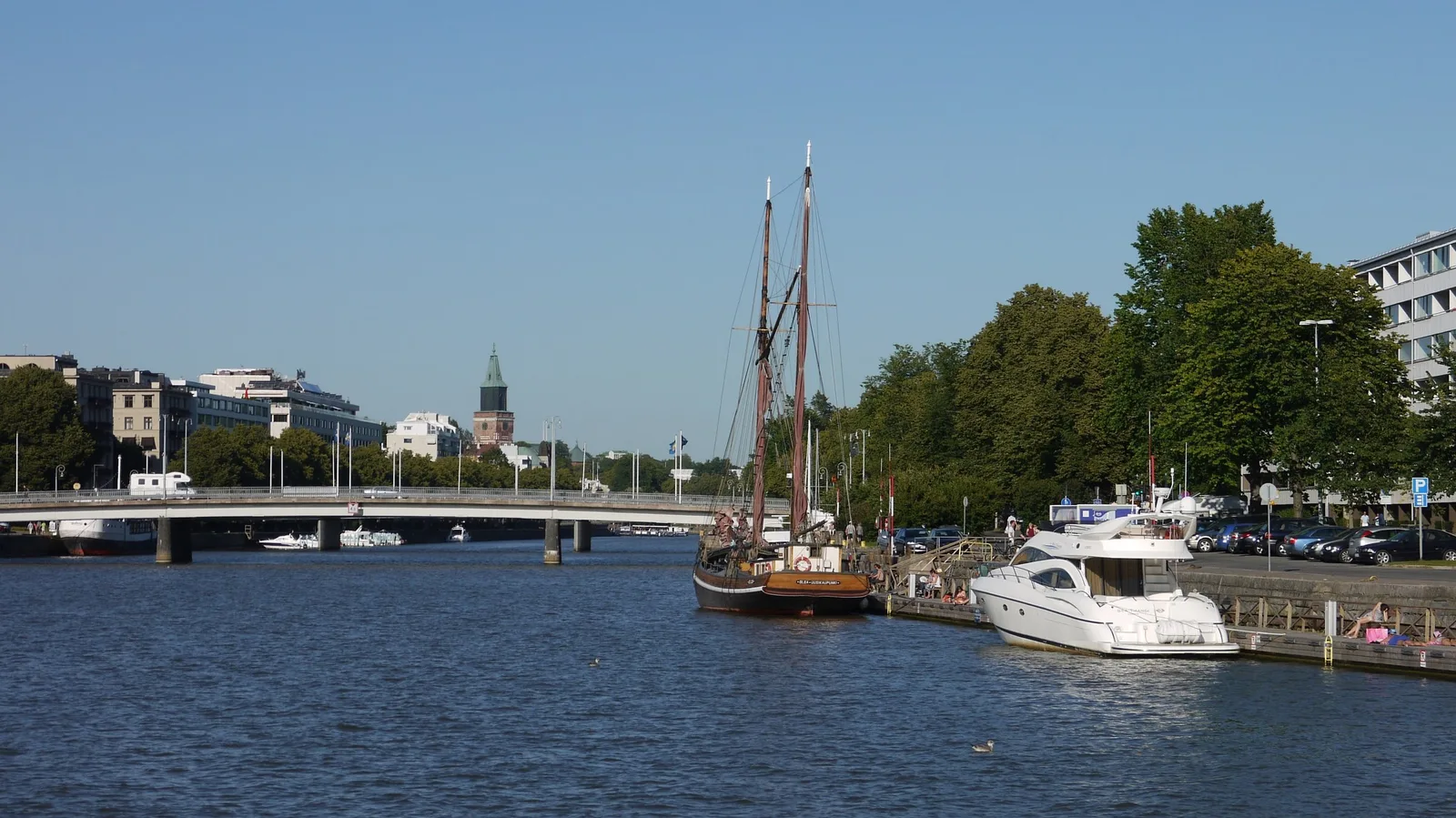 The Aura river in Turku, with a sailing ship moored along the riverbank